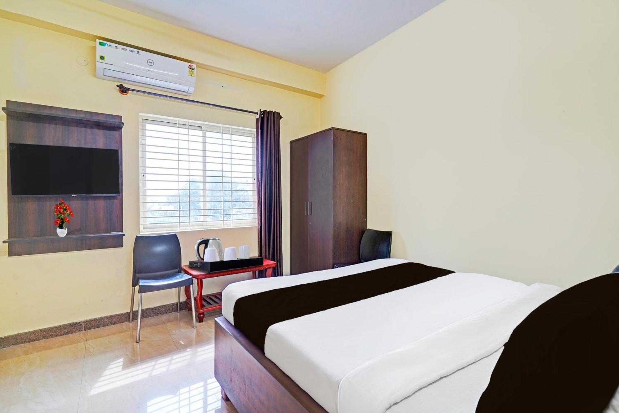 Super Hotel O Srigandhakavalu Formerly Chamundeshwari Lodging Jalahalli Bagian luar foto